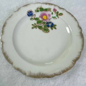 Mid century Japan butter gold trimmed floral dish.